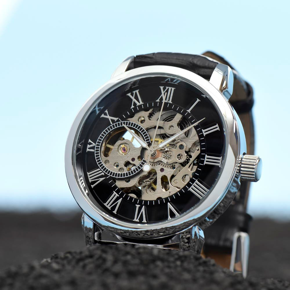Fashion Watch Open face watch see the interior or the watch..he watch is mounted in black sand.