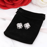 Elevate your gift by adding these Dazzling Love Knot Stud Earrings.